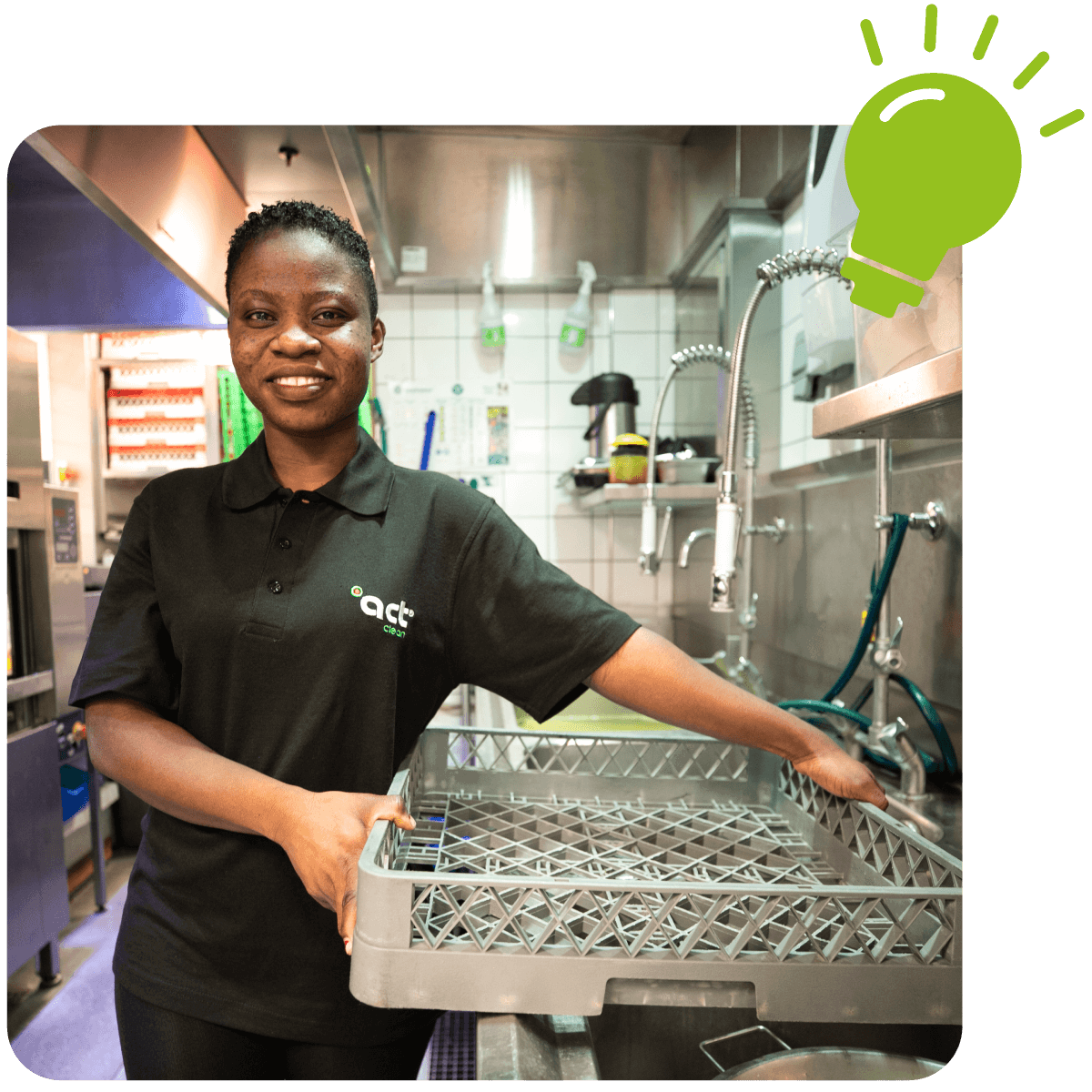 Act-Clean hospitality worker handling a dish rack in a kitchen setting, promoting practical skills through eLearning for Hospitality.